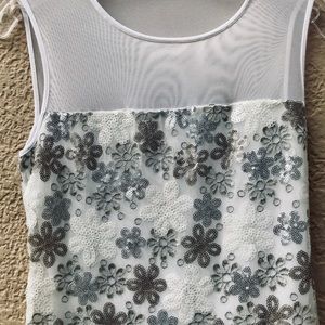 White and silver sequined dress